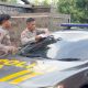Polres Purwakarta Pasang Stiker Layanan Darurat 110 di Kendaraan Dinas